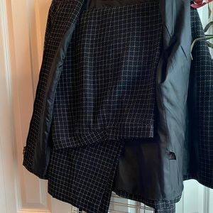 Josephine Chaus pantsuit. Jacket have leather trim along the zipper.